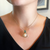 14K Gold Pendant with Large Pearl and Opals on model