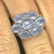 18K White Gold Cabochon Blue Chalcedony Ring with Seven Prong Set Stones