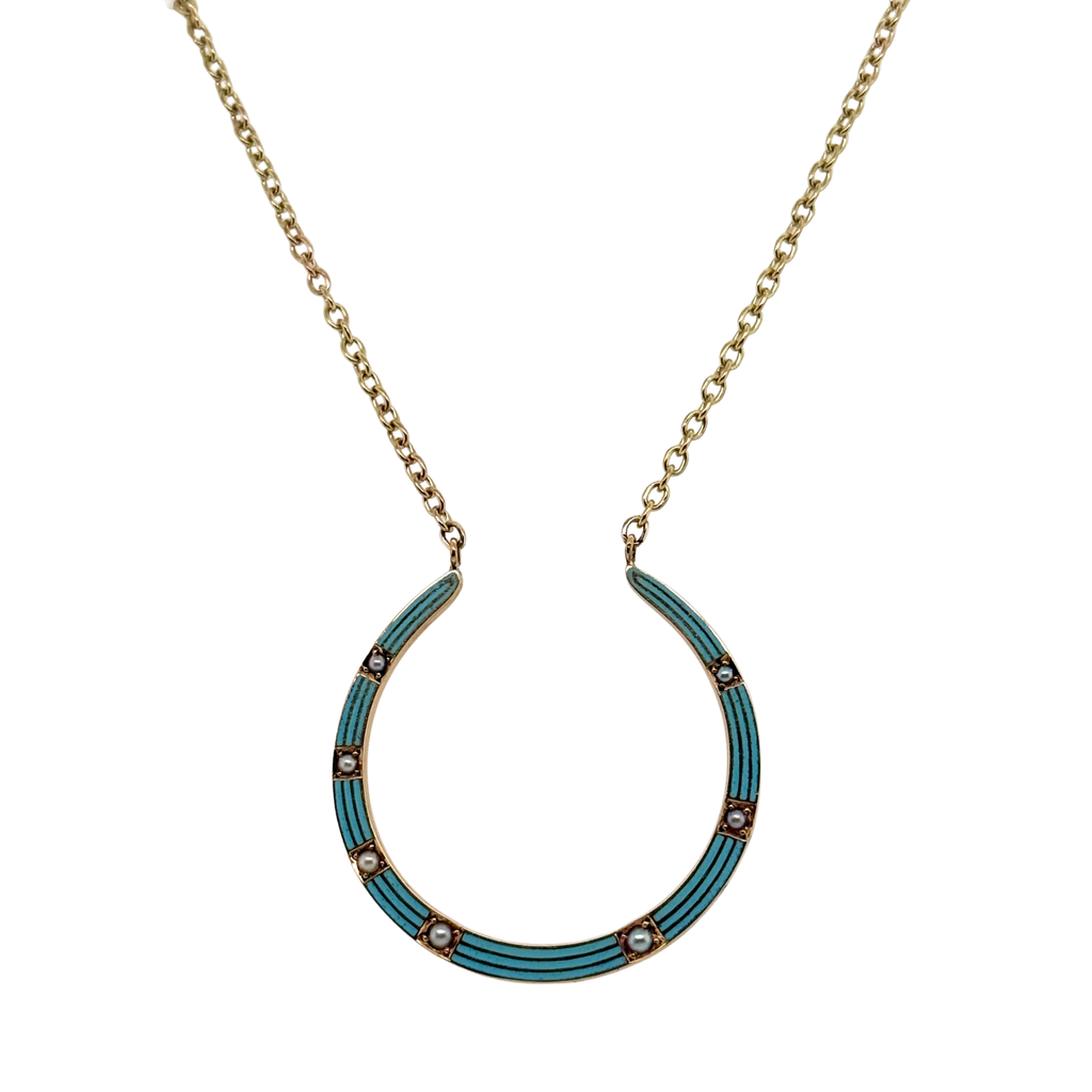 Antique Riker Brothers 14K gold horseshoe necklace with blue enamel stripes and seed pearls, front view