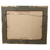 Back of the American Impressionist oil painting on artist board in its frame