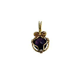 Back of the gold amethyst pendant showing the faceted underside of the stone