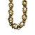 Close-up of pearl framed by smooth and twisted 14K yellow gold elements