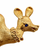 Close-up of the reindeer's expressive face showing the blue sapphire eye and polished gold accents
