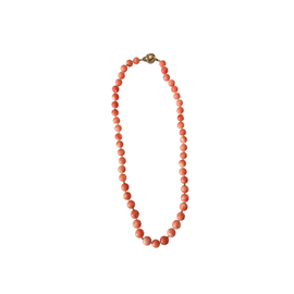 Coral strand necklace with large polished beads