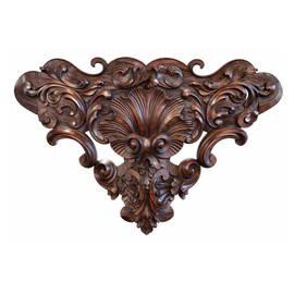 Close‑up of the George III console table’s carved mahogany apron showing scrolling acanthus leaves and central shell motif, circa 1770.