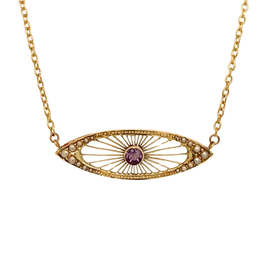Front view of an Edwardian 14K gold necklace with a central bezel-set amethyst and graduated seed pearls
