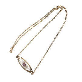 Full-length view of the amethyst and seed pearl centerpiece on an 18-inch fine gold chain