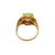 Underside view of a vintage gold ring showing the openwork gallery