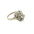 An antique-style diamond cluster ring in a silver-toned metal, featuring a central round diamond surrounded by smaller diamonds on a decorative setting, shown on a plain white background.