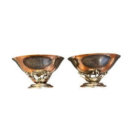 Pair of Georg Jensen sterling silver salts with tendril base and flared basin, front view