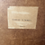 Paper label on the back of the Charles Richert painting inscribed "Charles H. Richert, Mass."