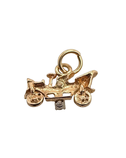 Reverse view of 14K gold antique car charm