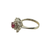 Side profile of 18k white gold ballerina ring showing 18K hallmark