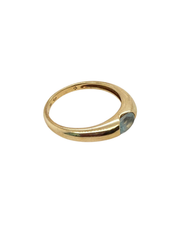 Side profile of the gold aquamarine ring showing the gently tapered polished band