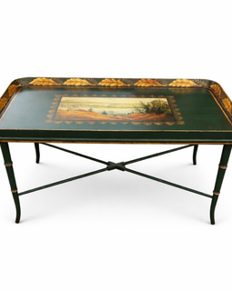 Vintage painted tray coffee table with a rectangular scenic landscape top, acanthus leaf border, and slender turned legs with stretcher base.