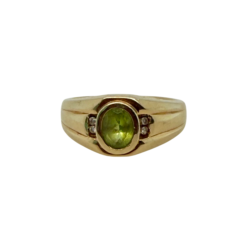 Vintage 14K gold men's peridot and diamond ring circa 1950, top view showing faceted green stone