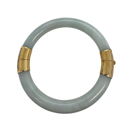 Vintage Chinese jadeite and 14K gold hinged bangle bracelet, mottled light green jade, top view