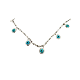 Vintage Tabbah necklace with three turquoise and onyx evil eye pendants, each surrounded by diamond‑set bezels on a white gold chain.