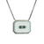 Art Deco rock crystal pendant showing white gold frame, diamond center, and enamel detailing.