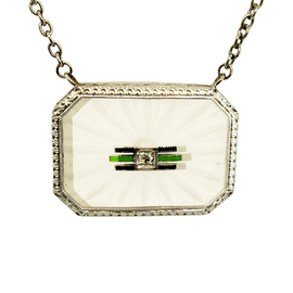 Art Deco white gold pendant necklace with carved rock crystal, central diamond, and green and black enamel accents.