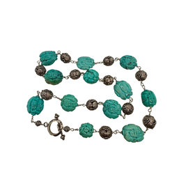 hand carved turquoise beads with longevity symbols