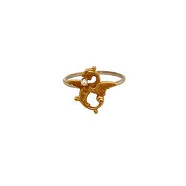 Victorian 14K gold griffin ring holding a seed pearl, converted from an antique stickpin

