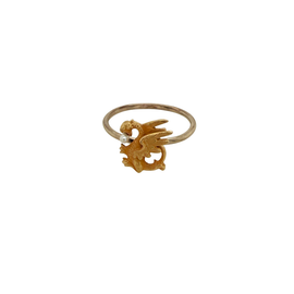 Close‑up of Victorian gold griffin motif with seed pearl on 14K ring