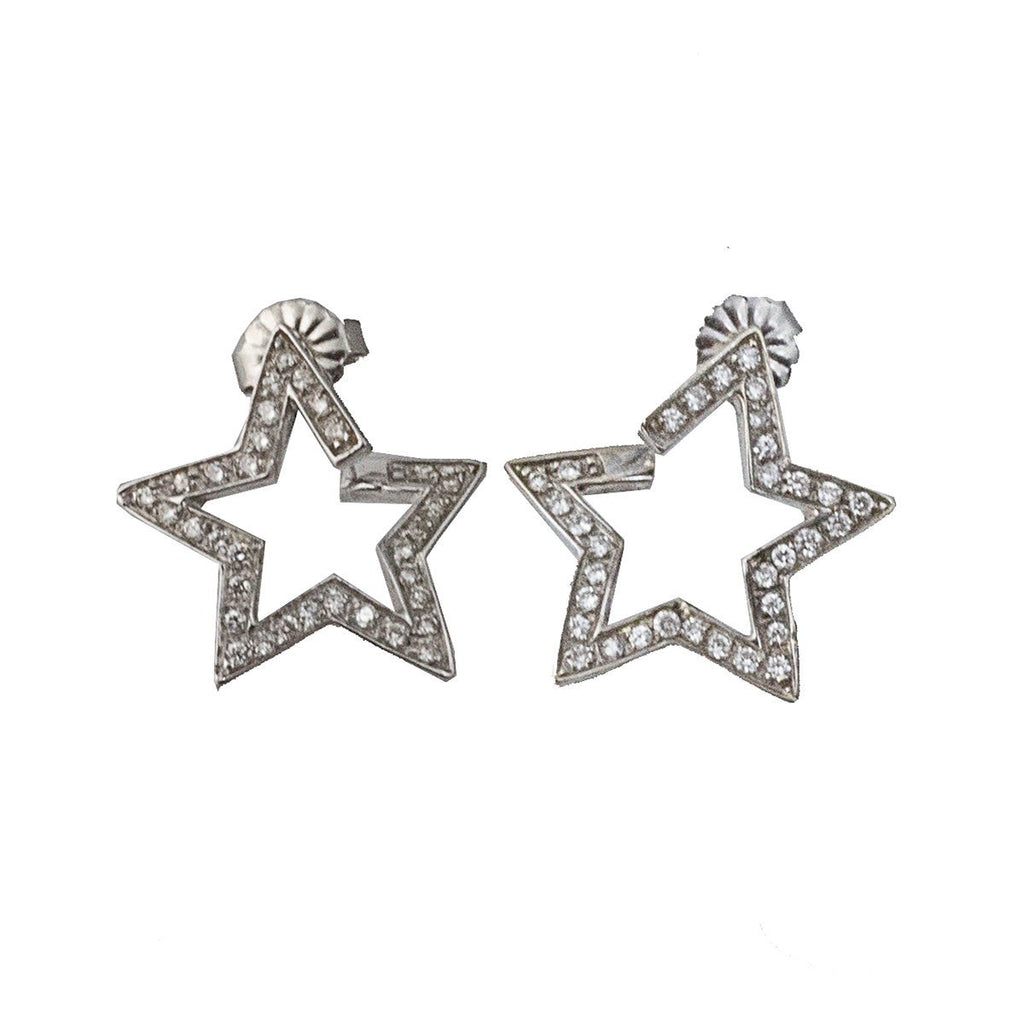 Platinum diamond star stud earrings, front view showing three-dimensional star shape.