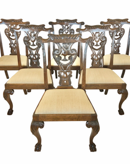 Set of six 19th century Georgian-style carved oak dining chairs with claw and ball feet